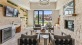 a clubroom with tv's, chairs and tables